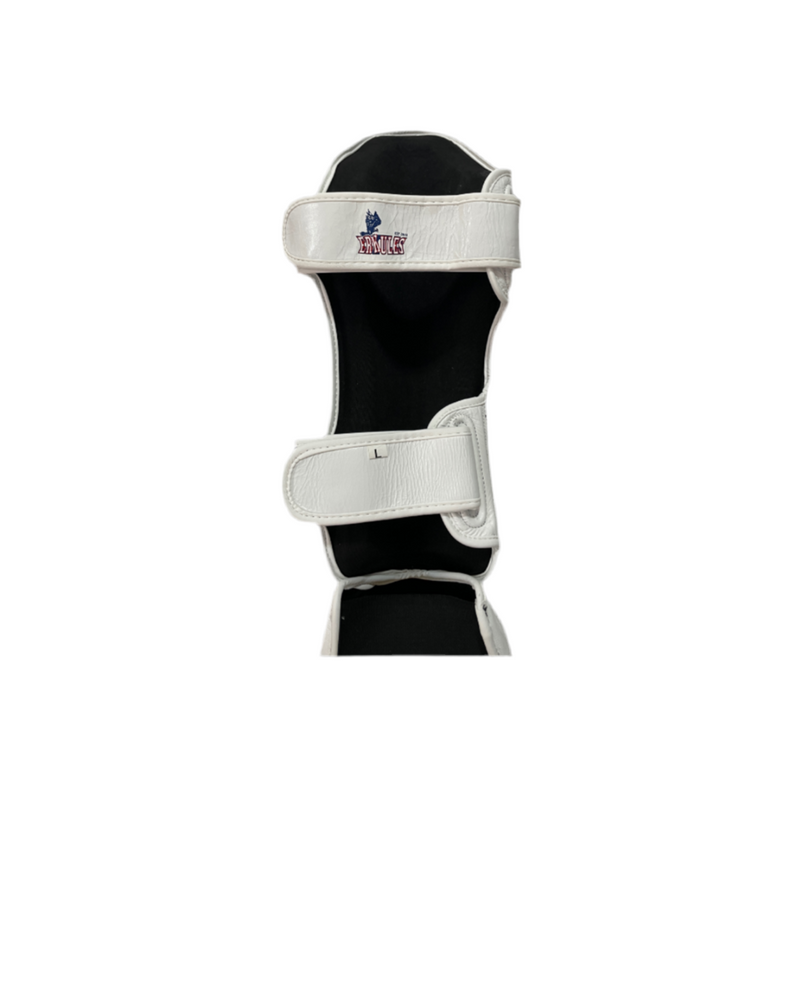 Paratibia professionali Erkules in pelle bianca con protezione rinforzata per tibia e collo del piede.
